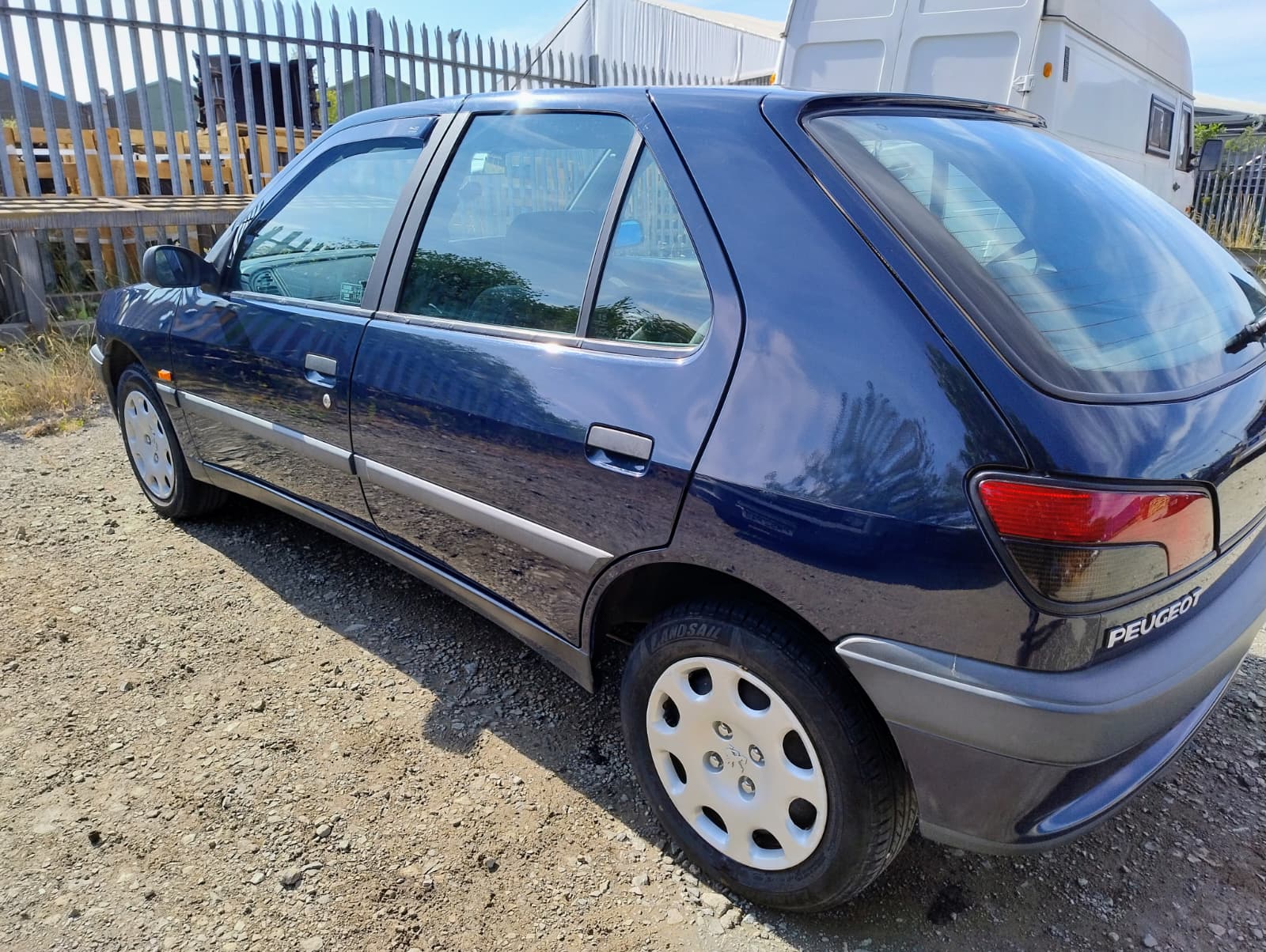 Blue Peugeot restored to a showroom shine by DJR Detailing