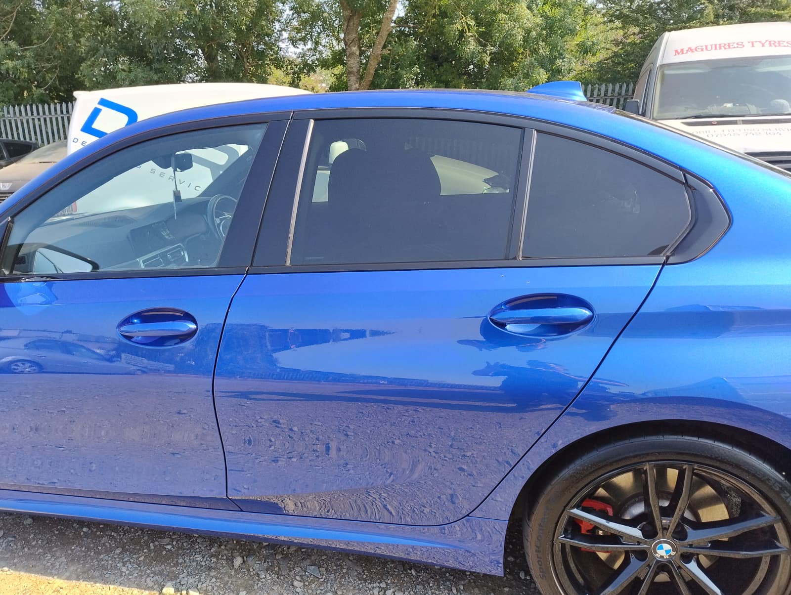 Metallic blue BMW with deep gloss paintwork after a detail